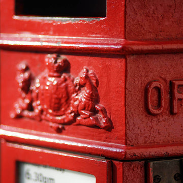 Closeup of a red royal mail post box