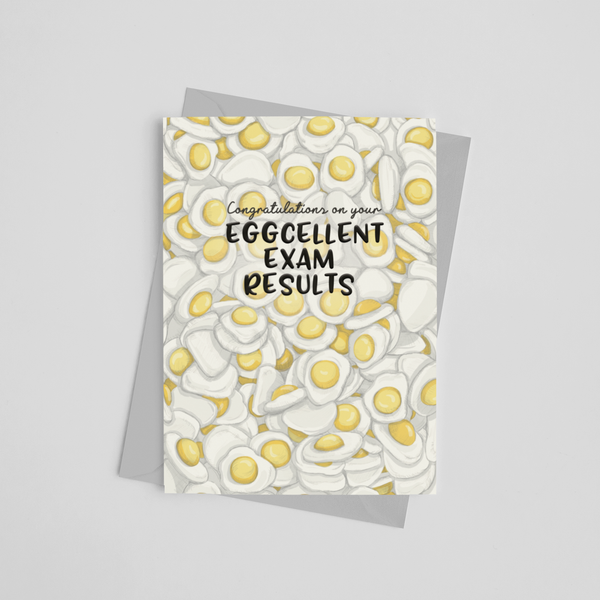 Exam congratulations card which reads congratulations on your eggcellent exam results with an illustration of lots of foam egg sweets in the background, designed by Wit and Wisdom UK.